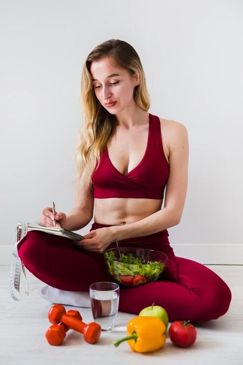 Woman preparing a meal with vegetables