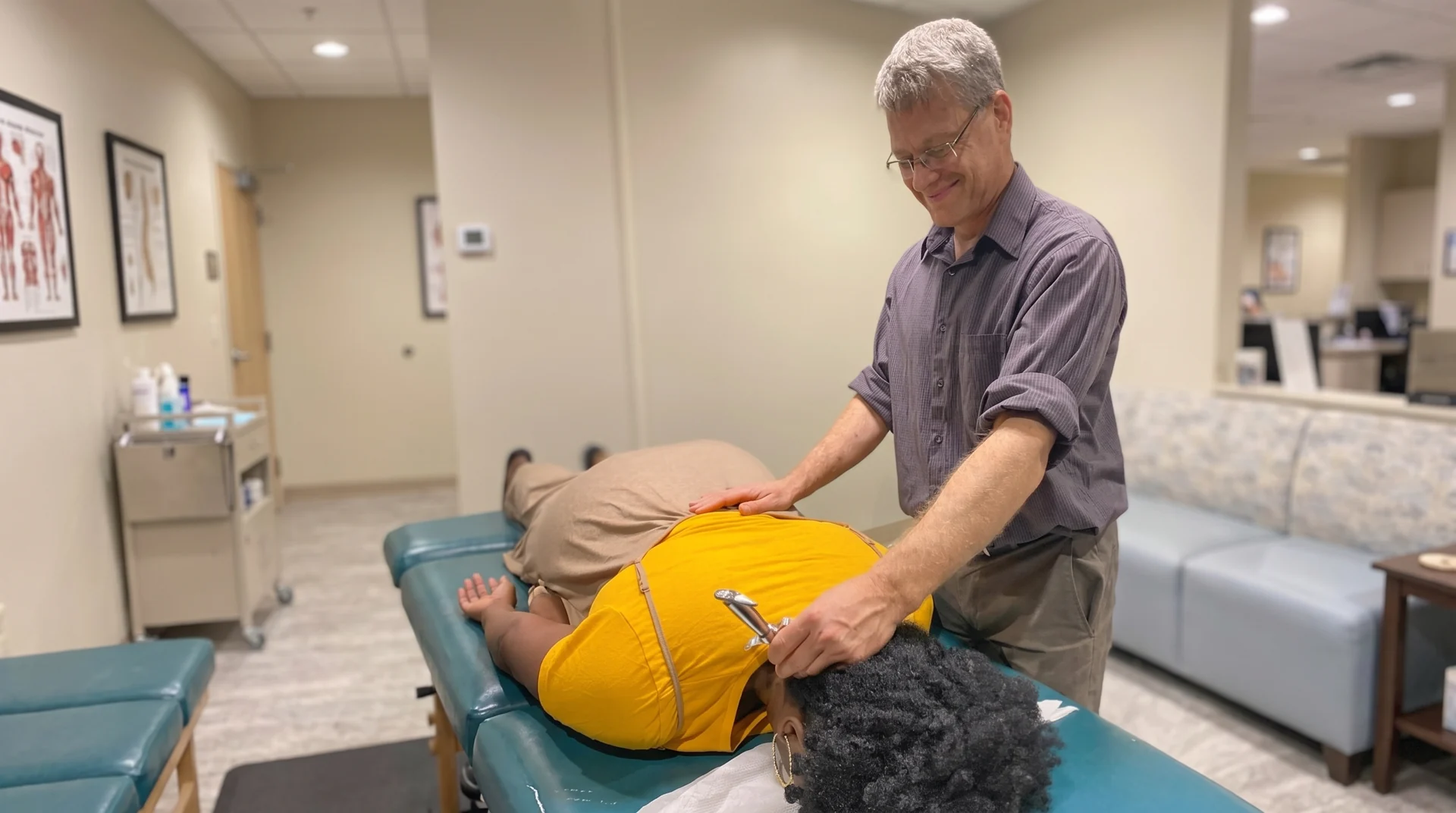 Chiropractic care with a patient on a treatment table